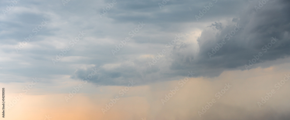 Dramatic Sky Background. Panoramic view of Stormy Clouds in Dark sky