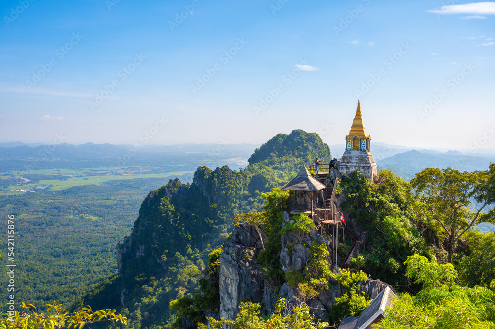 Wat Praputthabaht Sudthawat pu pha daeng, Wat Chaloem Phra Kiat Phrachomklao Rachanusorn. There is a pagoda built on a high rocky mountain by belief and faith. Unseen Thailand, Lampang, Thailand.