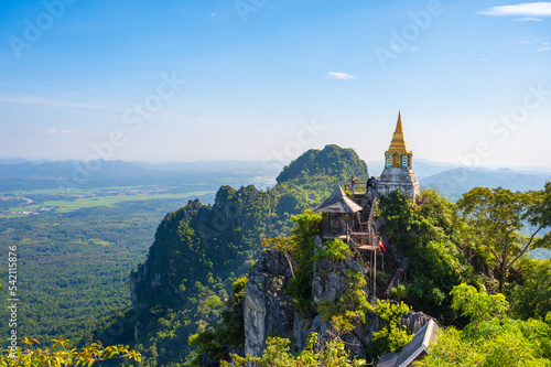 Wat Praputthabaht Sudthawat pu pha daeng, Wat Chaloem Phra Kiat Phrachomklao Rachanusorn. There is a pagoda built on a high rocky mountain by belief and faith. Unseen Thailand, Lampang, Thailand.