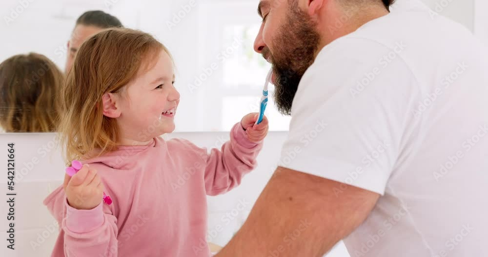 Happy family, dental and brushing teeth with girl and father in bathroom for hygiene, learning and grooming. Love, teeth and oral care by parent with daughter play, laugh and cleaning in their home Happy family, dental and brushing teeth with girl and father in bathroom for hygiene, learning and grooming. Love, teeth and oral care by parent with daughter play, laugh and cleaning in their home