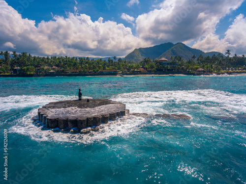 An aerial panoramic view on Candi Dasa shoreline on Bali island in Indonesia