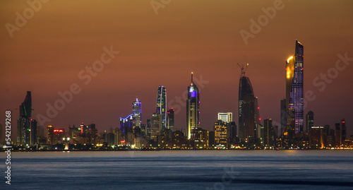 Sunset Sunrise and Blue Hours in Kuwait City Scape Landscape Panorama with a light in the Building.