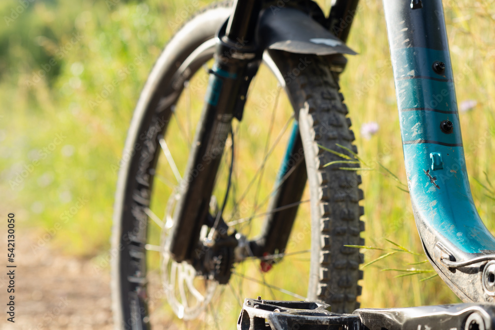 Detail of damaged mountain bike frame, front wheel and fork. Detail of damaged mountain bike frame, front wheel and fork.