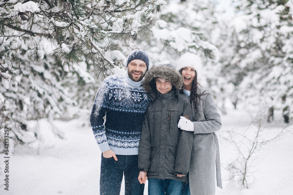 Loving family in winter spending time together. Loving family in winter spending time together.