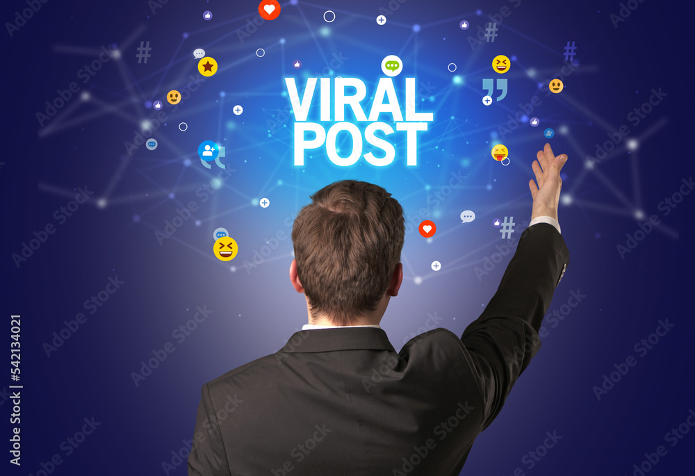 Rear view of a businessman, social media concept Rear view of a businessman, social media concept
