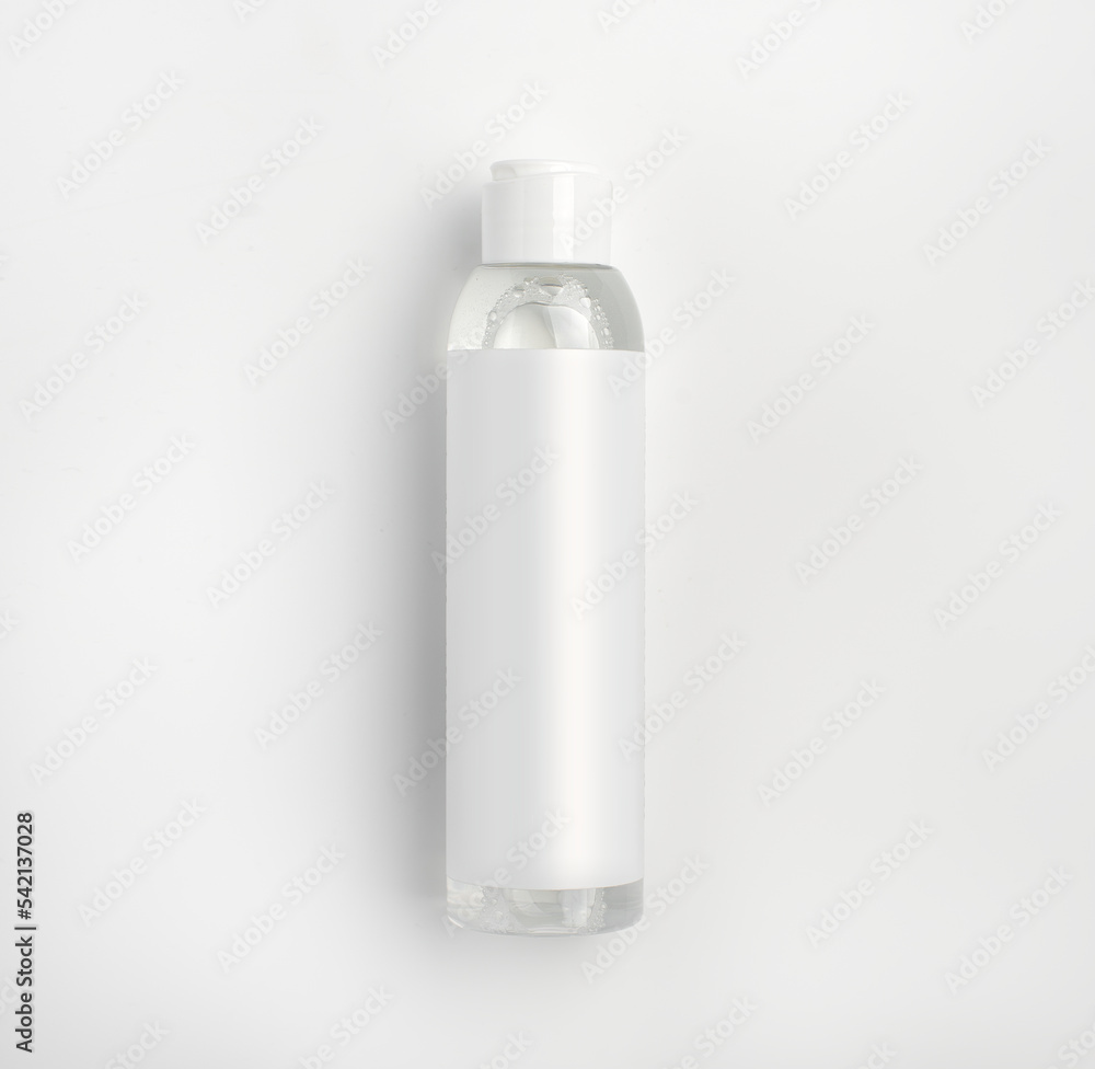 white plastic bottle with liquid