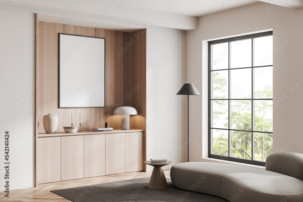 Fototapeta premium Corner view on bright living room interior with empty poster