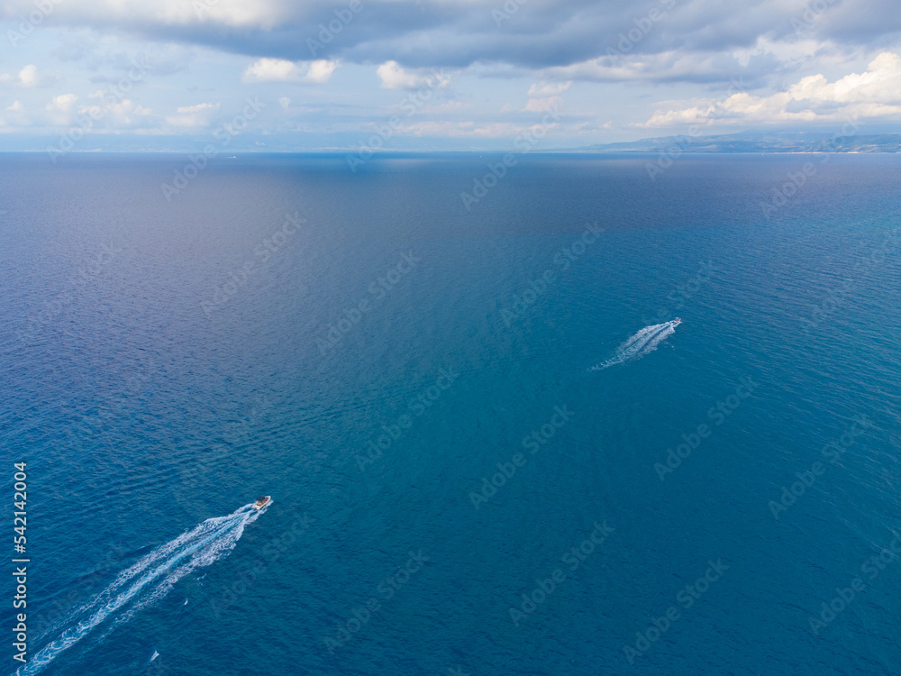 Boat in the middle of the sea Boat in the middle of the sea