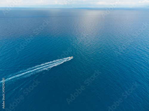Boat in the middle of the sea © simone