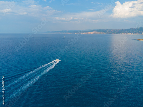 Boat in the middle of the sea © simone