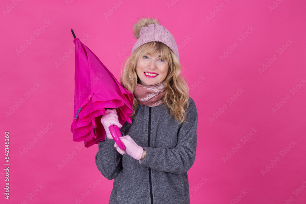 mature woman with umbrella isolated mature woman with umbrella isolated