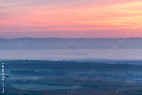 landschaft im nebel mit morgenrot photo