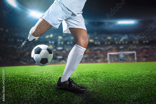 Soccer player in action on sport stadium background