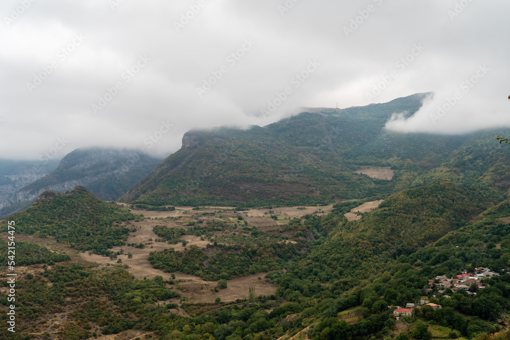 Dark rainy sky over mountains in Armenia in autumn.