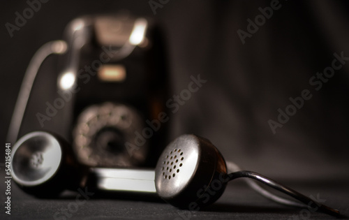 the forgotten handset of an old telephone photo