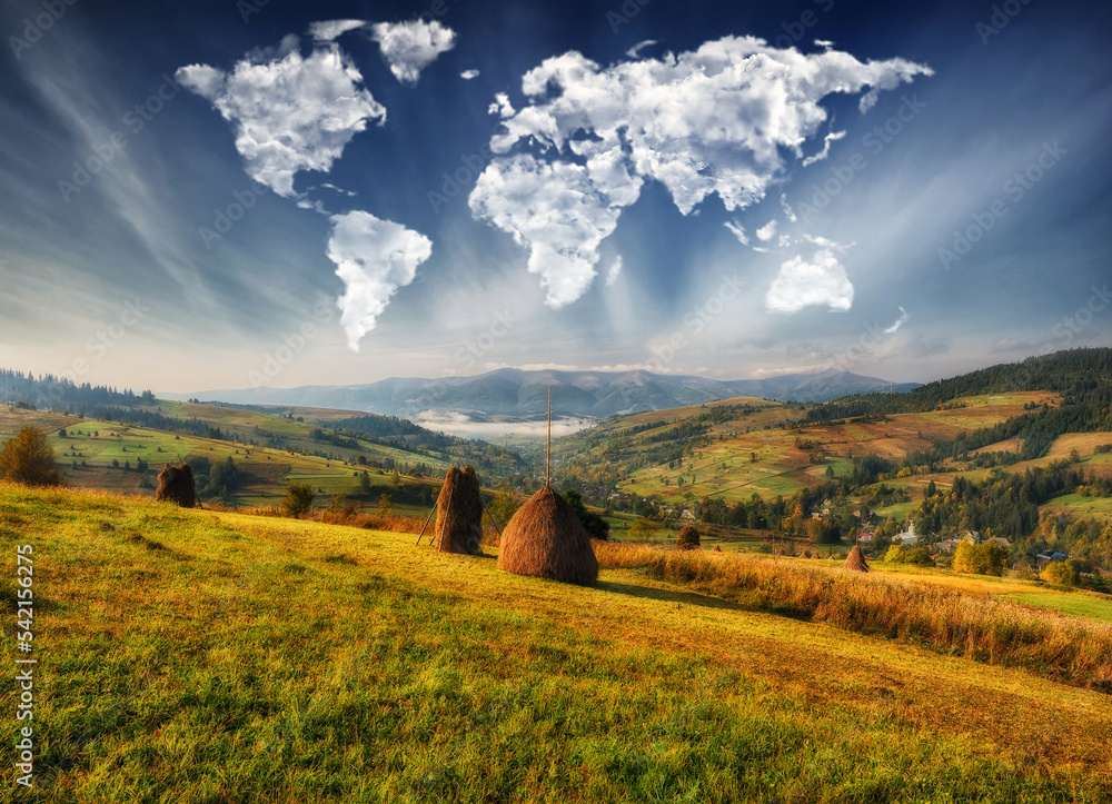 clouds in the form of a map of the world over the mountains. autumn dawn in the Carpathians. Travel and landscape concept clouds in the form of a map of the world over the mountains. autumn dawn in the Carpathians. Travel and landscape concept