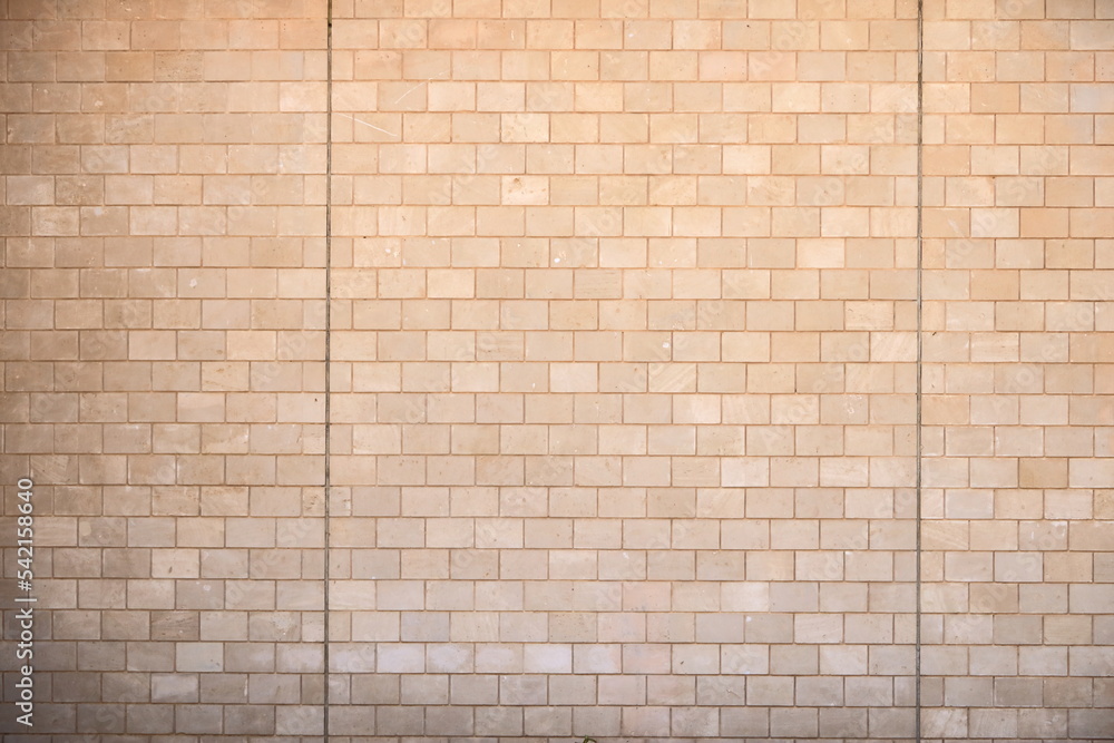 Fototapeta premium yellow Brick wall background. Stone wall background.