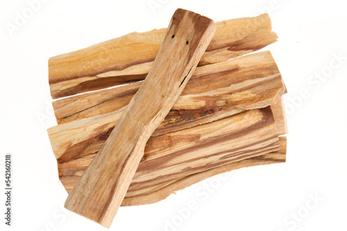 Palo Santo sticks – holy wood (Bursera graveolens), a tree species native to South America, used for incense, aromatic oil, and indigenous medicine. Isolated on white background. Close up, top view