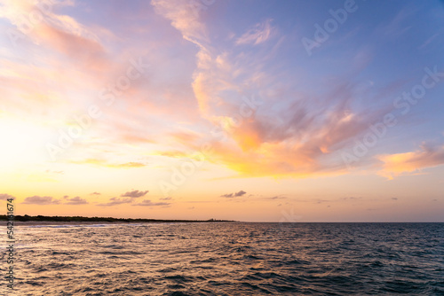 Print op canvas Golden colors of a sunset over the Atlantic Ocean in Florida
