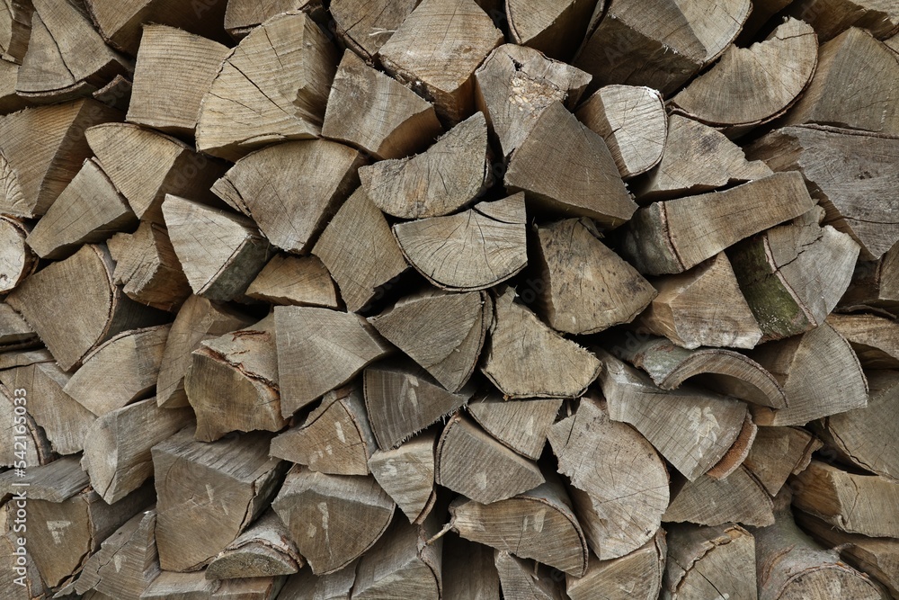 Pile of chopped firewood as background, closeup Pile of chopped firewood as background, closeup