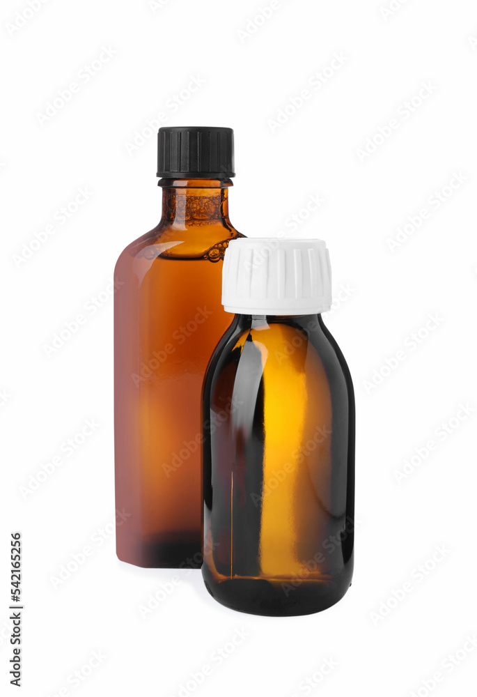 Bottles of syrups on white background. Cough and cold medicine Bottles of syrups on white background. Cough and cold medicine