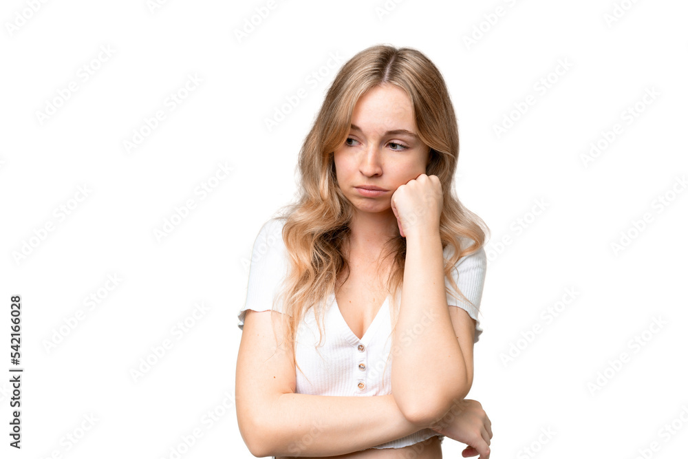 Young English woman over isolated background with tired and bored expression Young English woman over isolated background with tired and bored expression