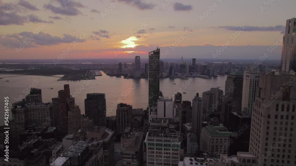 Aerial view of Manhattan in sunset rime. Skyscrapers in New York. Wall street of down town NYC. Aerial view of Manhattan in sunset rime. Skyscrapers in New York. Wall street of down town NYC.