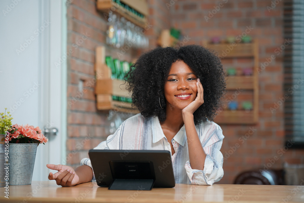 Happy woman holding credit card to do shopping online on computer and smiling. Person feeling excited about buying clothes on website, using banking money to make purchase on internet Happy woman holding credit card to do shopping online on computer and smiling. Person feeling excited about buying clothes on website, using banking money to make purchase on internet