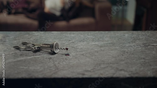 A young girl in a white shirt hugs a man and they lie down on the sofa, a romantic date at home.