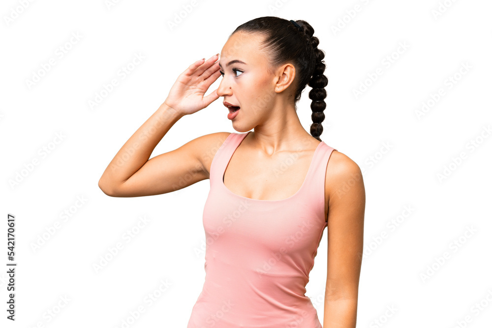 Young Arab woman over isolated background with surprise expression while looking side Young Arab woman over isolated background with surprise expression while looking side