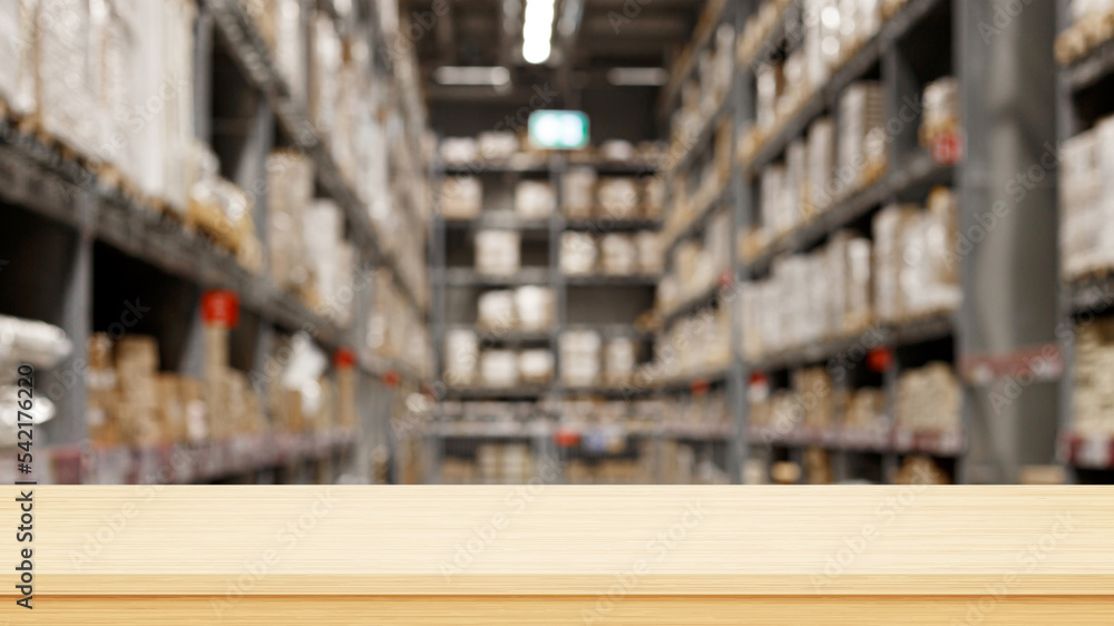Empty wood table top with blur huge distribution warehouse background, Template mock up for display of product Empty wood table top with blur huge distribution warehouse background, Template mock up for display of product