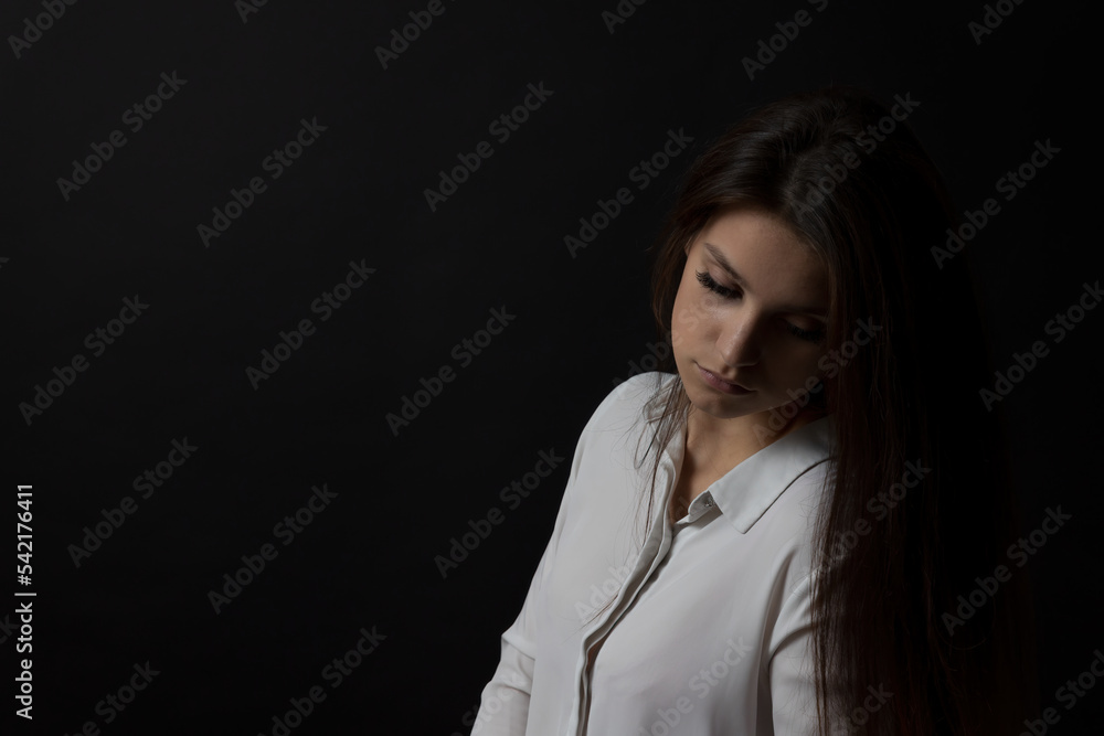 Studio portrait of sad young woman. Horizontally. Studio portrait of sad young woman. Horizontally.
