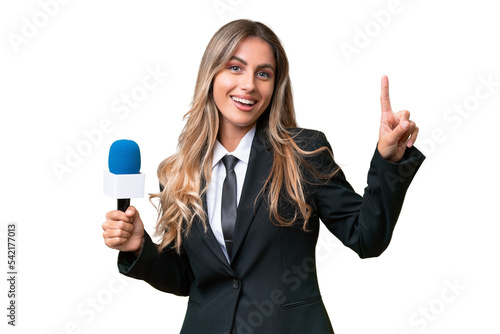 Foto Young pretty Uruguayan tv presenter over isolated background showing and lifting