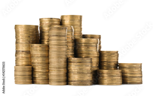 Many golden coins stacked on white background