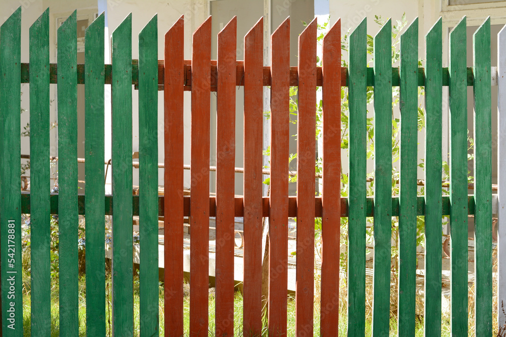 Fototapeta premium Wooden fence on sunny day outdoors, closeup