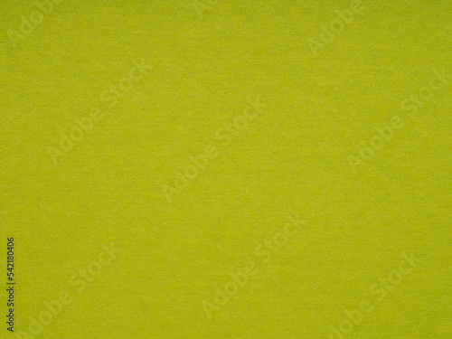 Green recycled paper cardboard, background and texture. For making winter season Christmas festival card, new year designs decoration, text, lettering, wall screen saver or art work. Blank page.