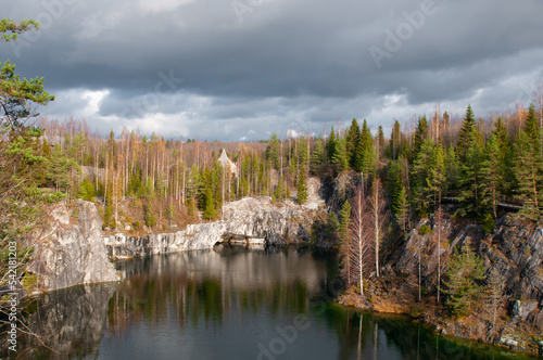 Fototapeta Naklejka Na Ścianę i Meble -  Autumn forest by a mountain lake. Northern landscape