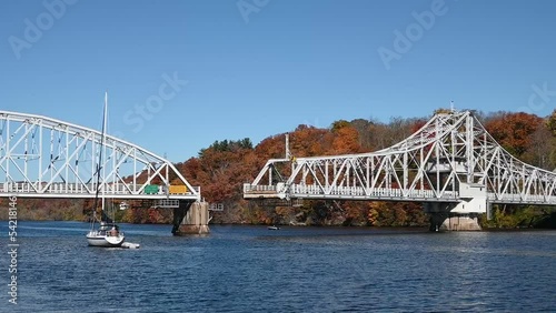 The East Haddam Swing Bridge opens to let boat traffic pass through on the Connecticut River. The bridge was built in 1913 to connect the town of Haddam and East Haddam, Connecticut over Rt. 82.  photo