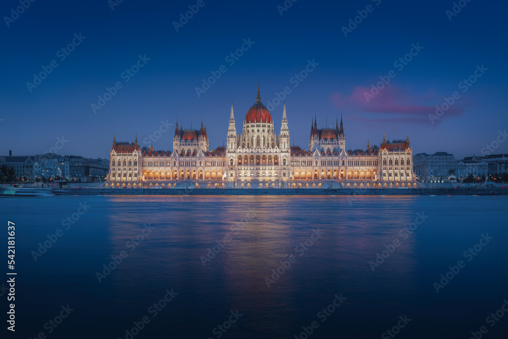 Hungarian Parliament and Danube River at night - Budapest, Hungary