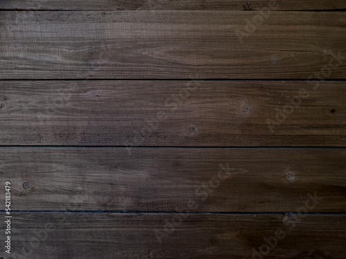 The texture of a wooden brown background.