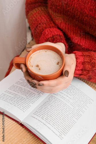 Woman with cup of coffee re...