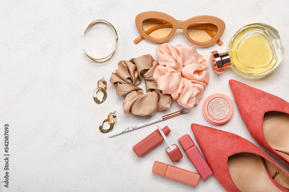 Female accessories and shoes on white background Female accessories and shoes on white background