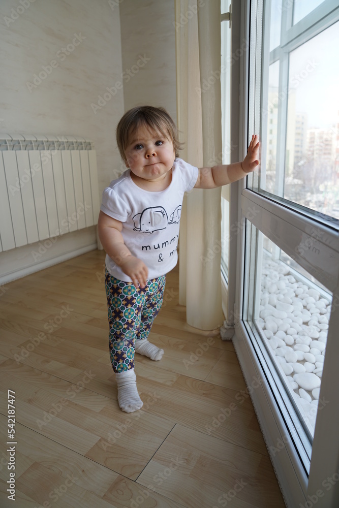 little child playing in the room