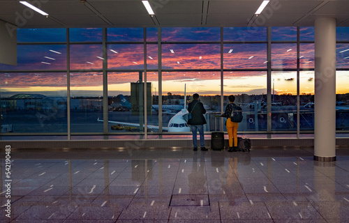 Airport Munich reflection sunrise couple watching 
