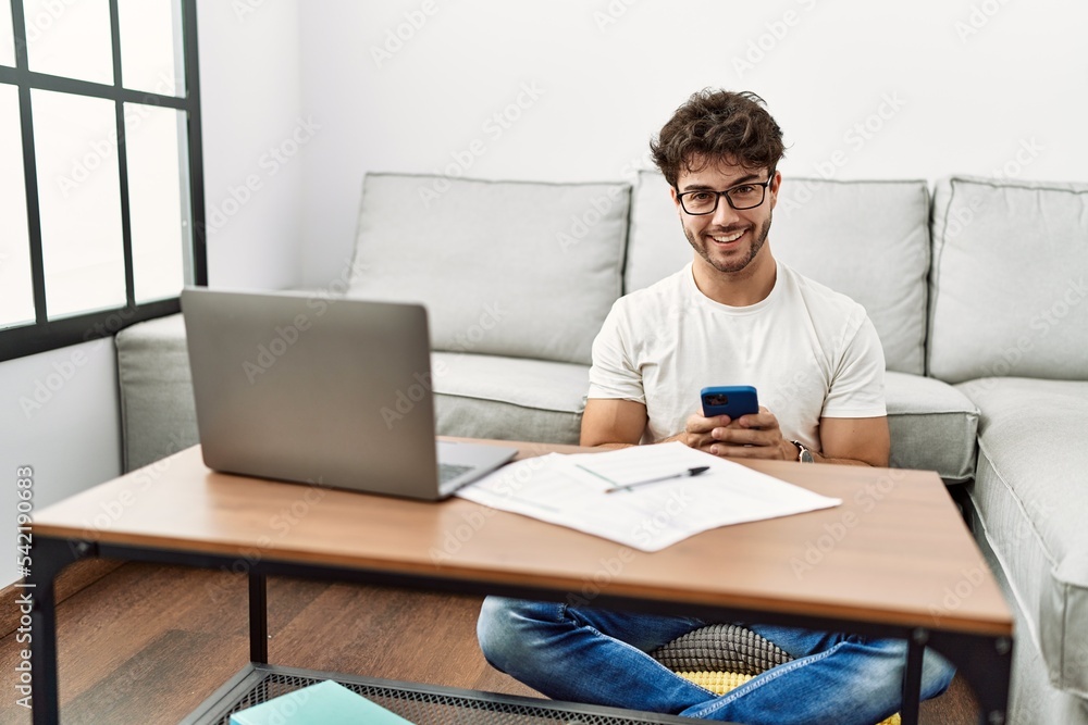 Young hispanic man smiling confident working at home Young hispanic man smiling confident working at home