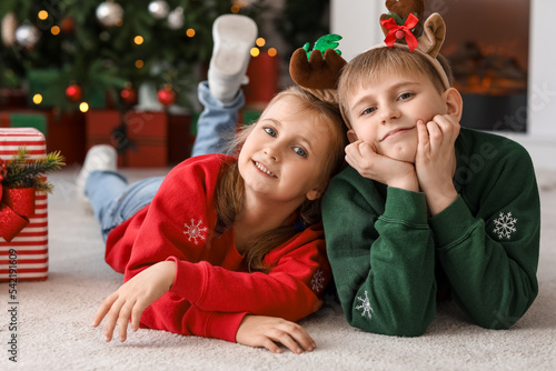 Happy young children wearin...
