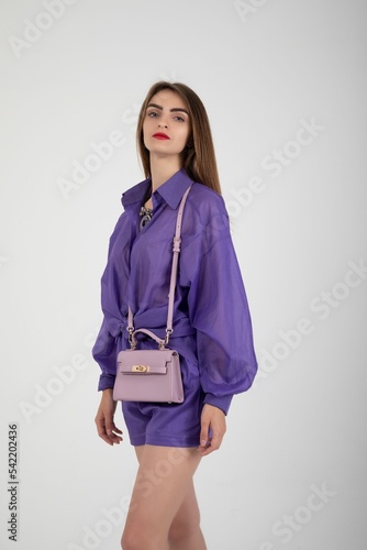 Stunning model posing in a purple short set