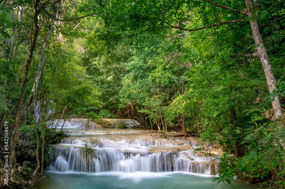 Beautiful waterfall in the forest at Erawan waterfall National Park, Thailand Beautiful waterfall in the forest at Erawan waterfall National Park, Thailand