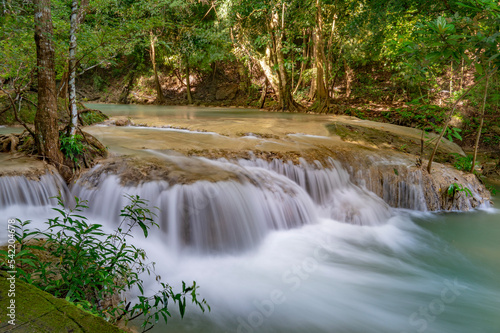 Beautiful waterfall in the forest at Erawan waterfall National Park, Thailand