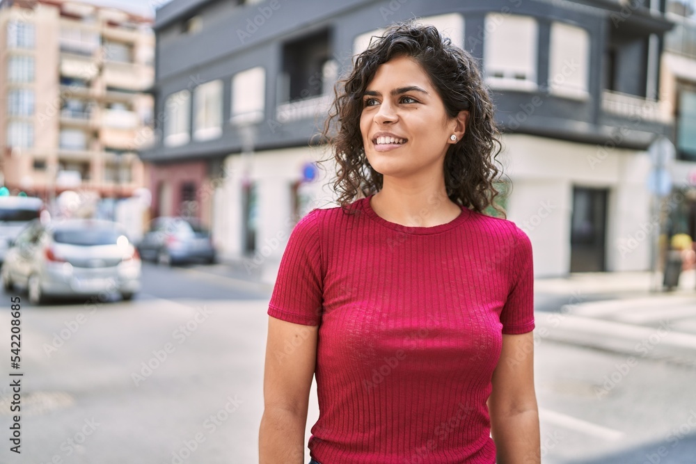 Young latin woman smiling confident standing at street Young latin woman smiling confident standing at street